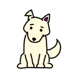 首をかしげる犬