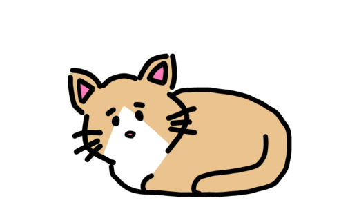 丸くなっている猫