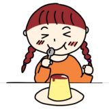 プリンを食べている女の子