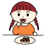 たこ焼きを食べる女の子